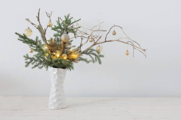 istock Christmas composition in white vase on white background 1188956198
