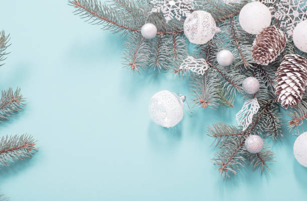 istock Christmas decorations on blue paper background 1188956216
