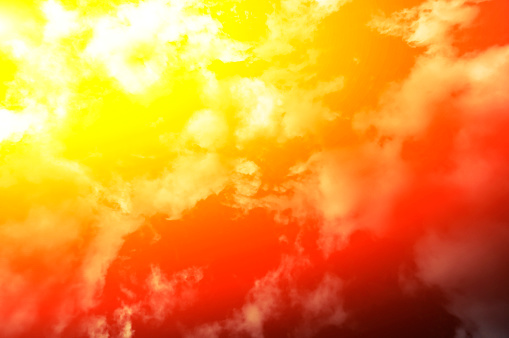 Fiery color sky and sun in  clouds. Concept. View from below.