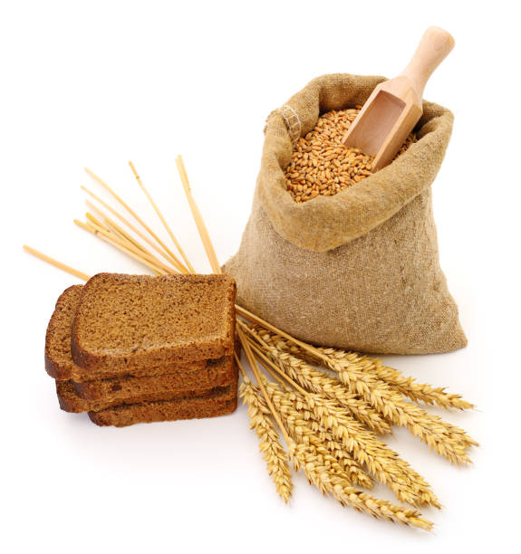istock Wheat in a sack, ears and bread. 1188958827