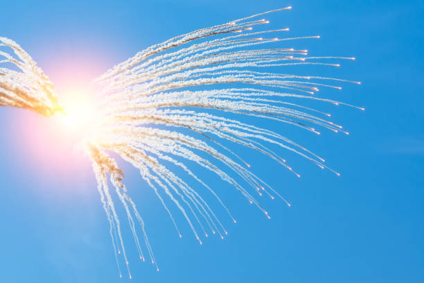 istock Explosion of a shell in the sky and burning debris flying with smoke. 1188960147
