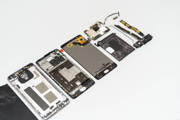 istock Details of broken modern smartphone on table 1188960744