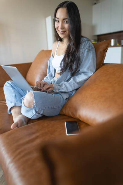 istock Woman having a rest on the sofa 1188961631