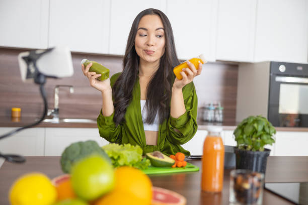 istock Young Asian female cook with a puzzled look 1188961736