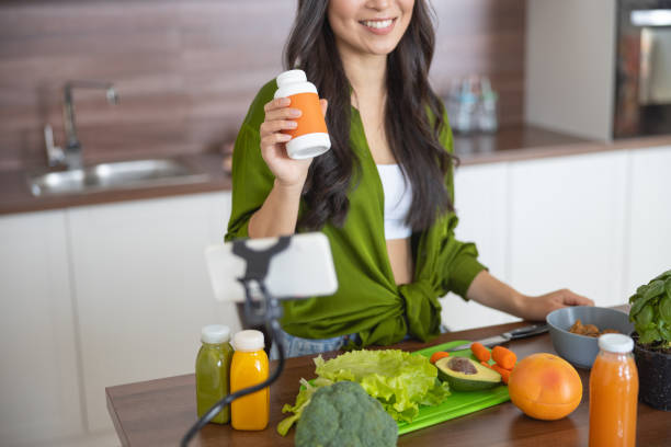 istock Smiling young blogger talking about healthy diet 1188961814