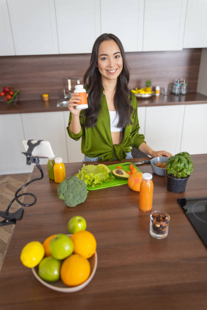 istock Pleased young woman posing for the camera 1188961816