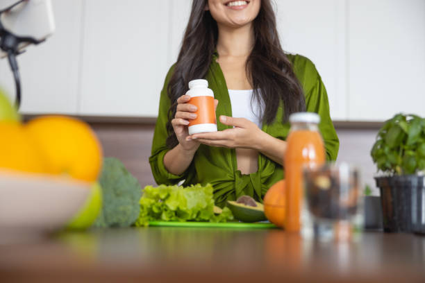 istock Girl holding a plastic bottle in both hands 1188961854