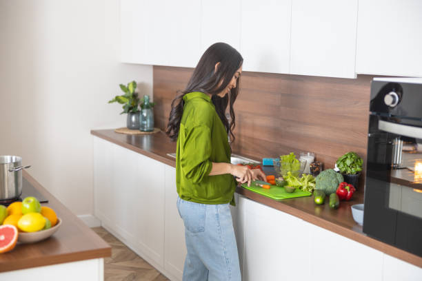 istock Attractive modern young woman smiling at work 1188961877