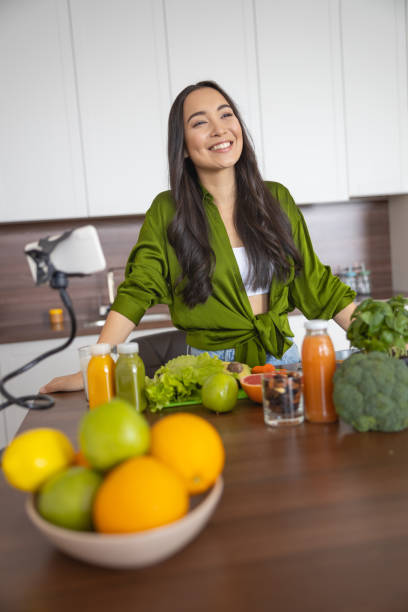istock Happy video blogger looking into the distance 1188962086