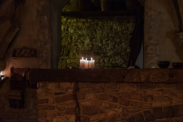 istock Big candle in a plate on a wooden table 1188970400
