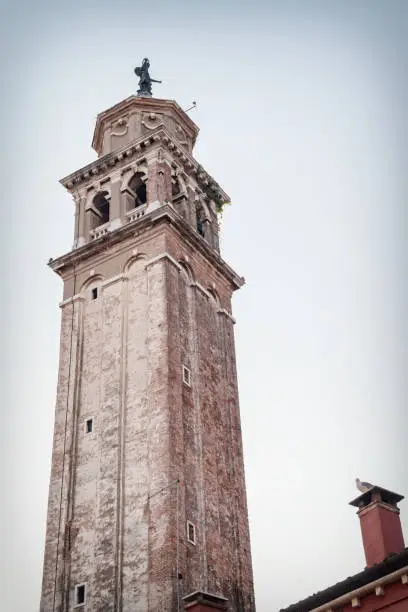 Venice, Italy. Bell tower of church Santa Maria dei Carmini, a large Roman Catholic church