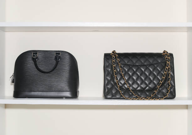 istock Black hand bag closeup. Designer handbag 1188972271