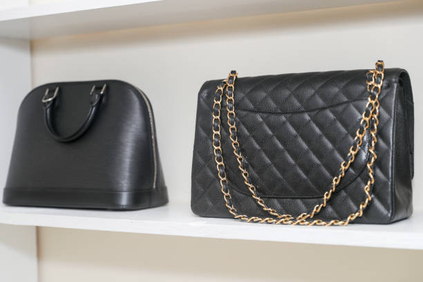 Black hand bag closeup. Designer handbag stock photo