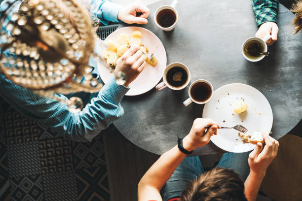 istock Family breakfast at the oval table by the window 1188974743