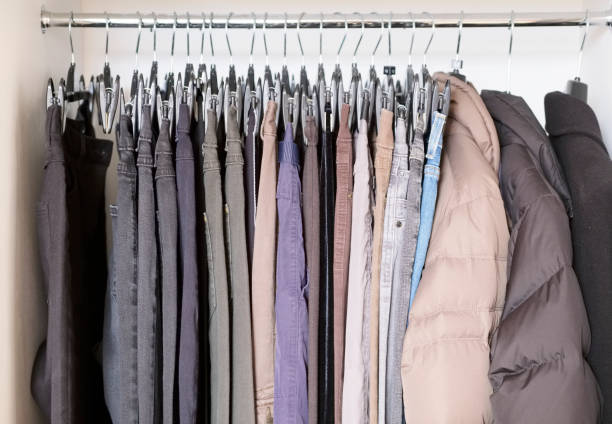 istock Charity clothes hanging up in wardrobe 1188978527