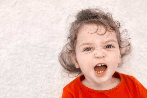 istock Baby girl shouting and feeling displeased 1188978764