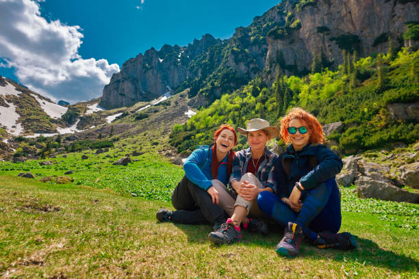 istock Three friends in the mountains, hiking 1188978775