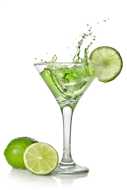 istock Green alchohol cocktail with splash on white 118898161