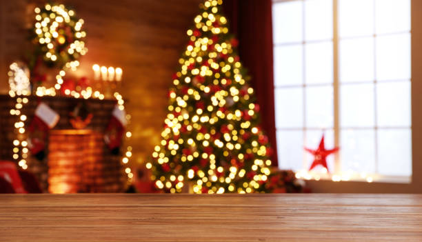 interior christmas. magic glowing tree, fireplace, gifts - christmas table imagens e fotografias de stock