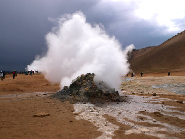 The Namafjall Hverir Geothermal Area in Iceland is a hotbed of steam rising from the ground, making the landscape around it look like the planet Mars.