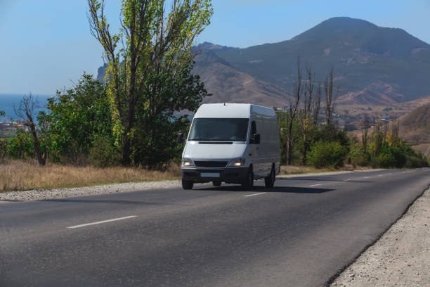 istock Minibus Rides on the  mountain highway 1188993867