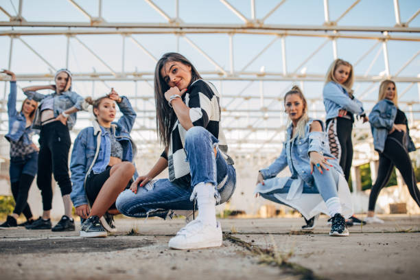 istock Group of young female dancers 1188996592
