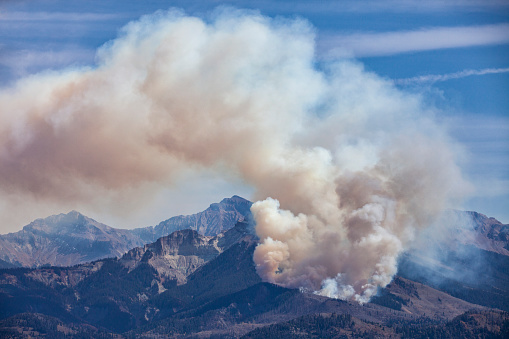 A wildfire burns in the National Forest of Southwest Colorado.
