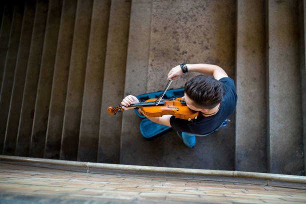 istock Street musician playing violin 1189000751
