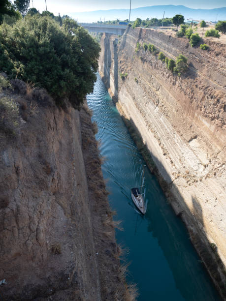 istock Yacht Sailing Through the Corinth Canal 1189002324