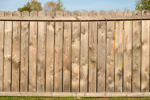 wooden fence from boards in the village