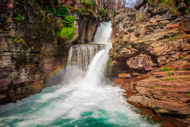 istock Rainbow on Saint Mary Falls, Glacier National Park 1189008345