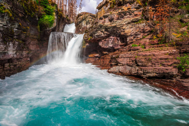 istock Rainbow on Saint Mary Falls, Glacier National Park 1189008368