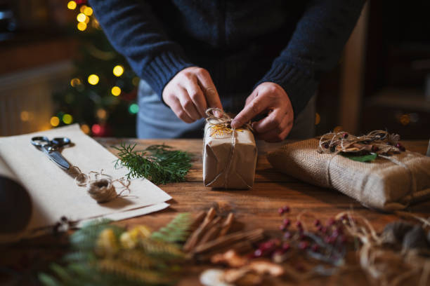 istock Man Making Christmas Gifts 1189010915