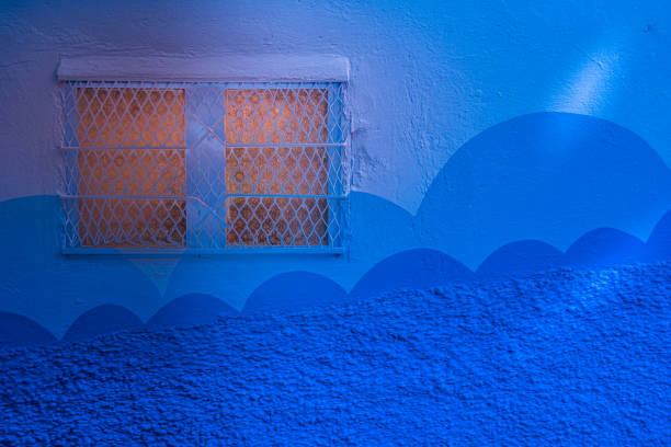 istock Panoramic view of the old traditional window on the blue wall 1189011248
