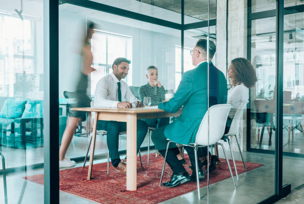 istock Team of professionals during a meeting. 1189012392