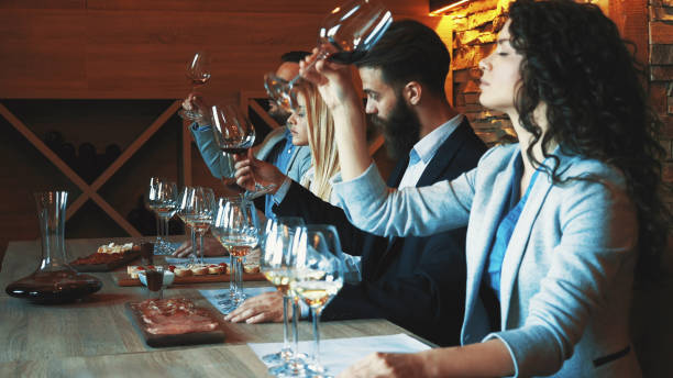 istock Friends tasting wine together 1189015697