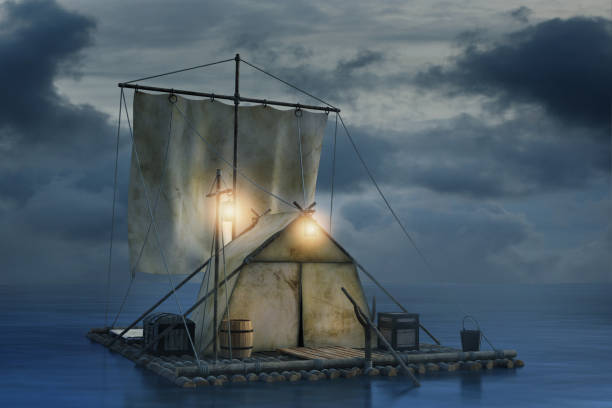 istock Old raft floating in the ocean at night with a tent, 3d render. 1189016559