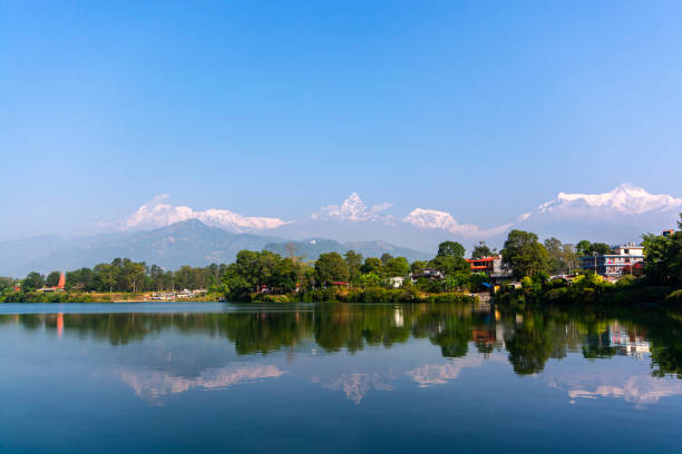 istock Reflection of mountains in lake, Phewa Lake, Nepal 1189018576