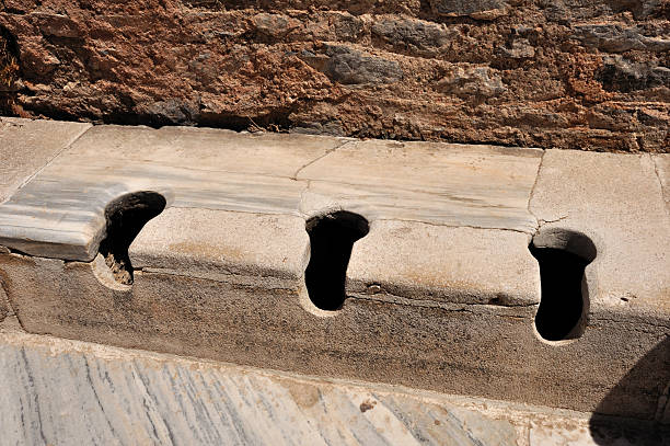 istock Ancient Public Toilets, Ephesus, Turkey 118901979