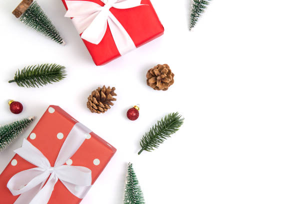 istock Christmas holiday composition with red gift box and decoration isolated on white background, new year and xmas or anniversary with presents in season, top view or flat lay. 1189022473