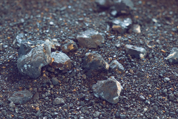 istock small naturally tin ore sifting from streams, process of panning for minerals 1189025813
