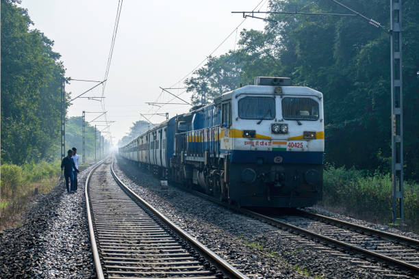 Passenger Train India Passenger train in the Countryside near Pune India. pune photos stock pictures, royalty-free photos & images
