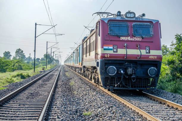 Passenger Train India Passenger train in the Countryside near Pune India. rail transportation stock pictures, royalty-free photos & images