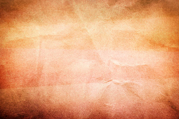 Grunge paper texture in brown tones stock photo