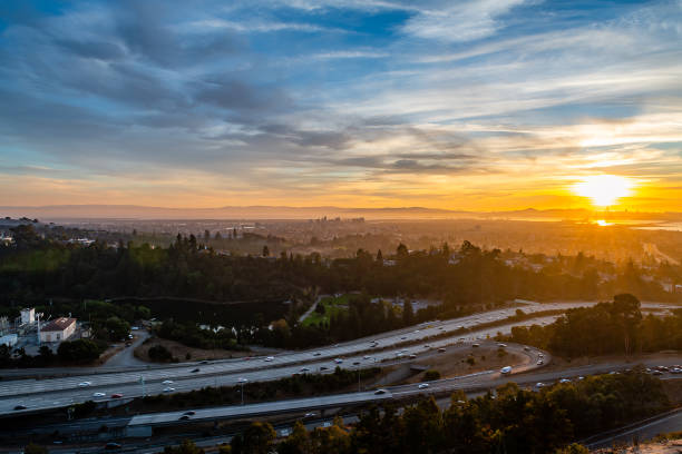 Autumn sunset over the San Francisco Bay The sun sets over Oakland and San Francisco on a crisp autumn evening. west marin stock pictures, royalty-free photos & images