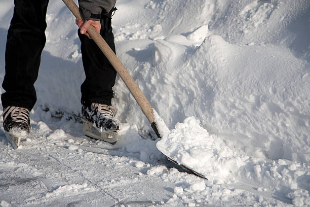 istock Man working with snow shovel 118903353