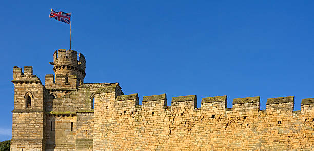 istock Old english city wall with union jack flag 118903403
