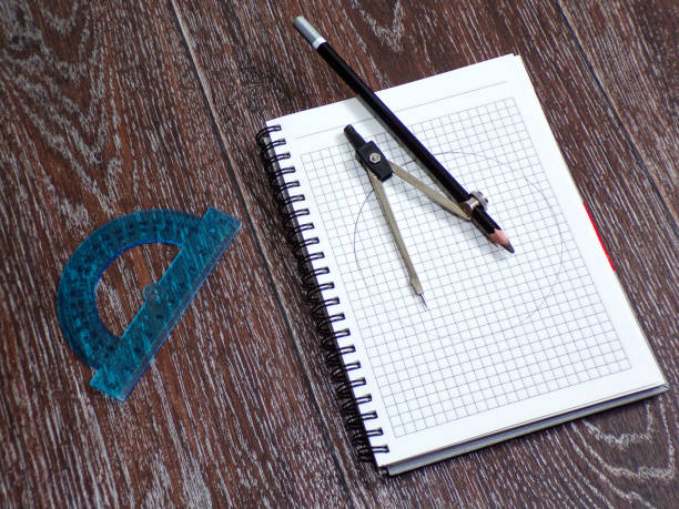istock Compasses with pencil and ruler in the workplace 1189059900