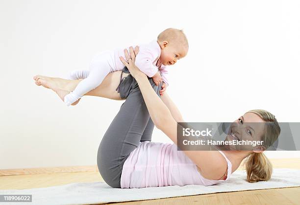 Mother And Baby Exercise Stock Photo - Download Image Now - Baby - Human Age, Yoga, Mother