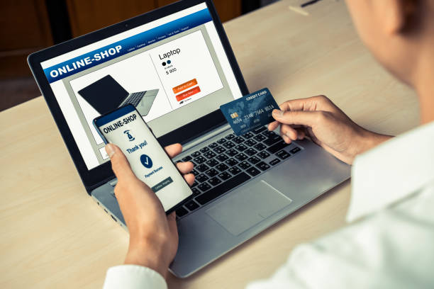 istock Young man use credit card for online shopping 1189062790